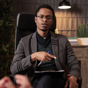 male psychotherapist doing psychoanalysis consultation